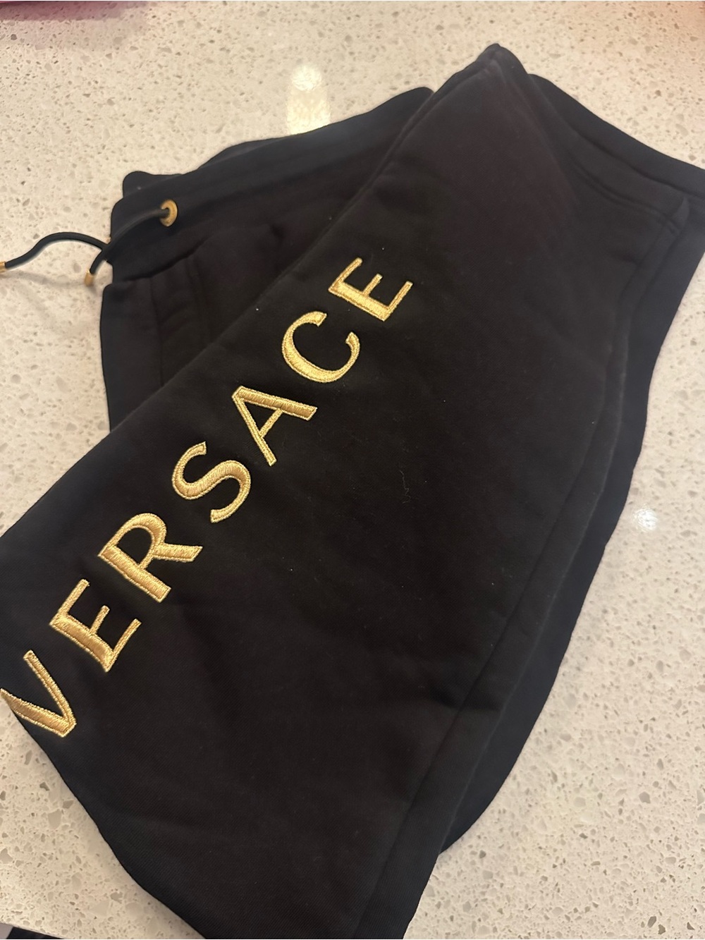Versace Black Sweatpants with Gold Logo Embroidery